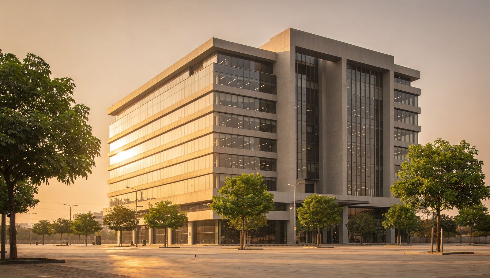 A contemporary office building in Hyderabad at golden hour