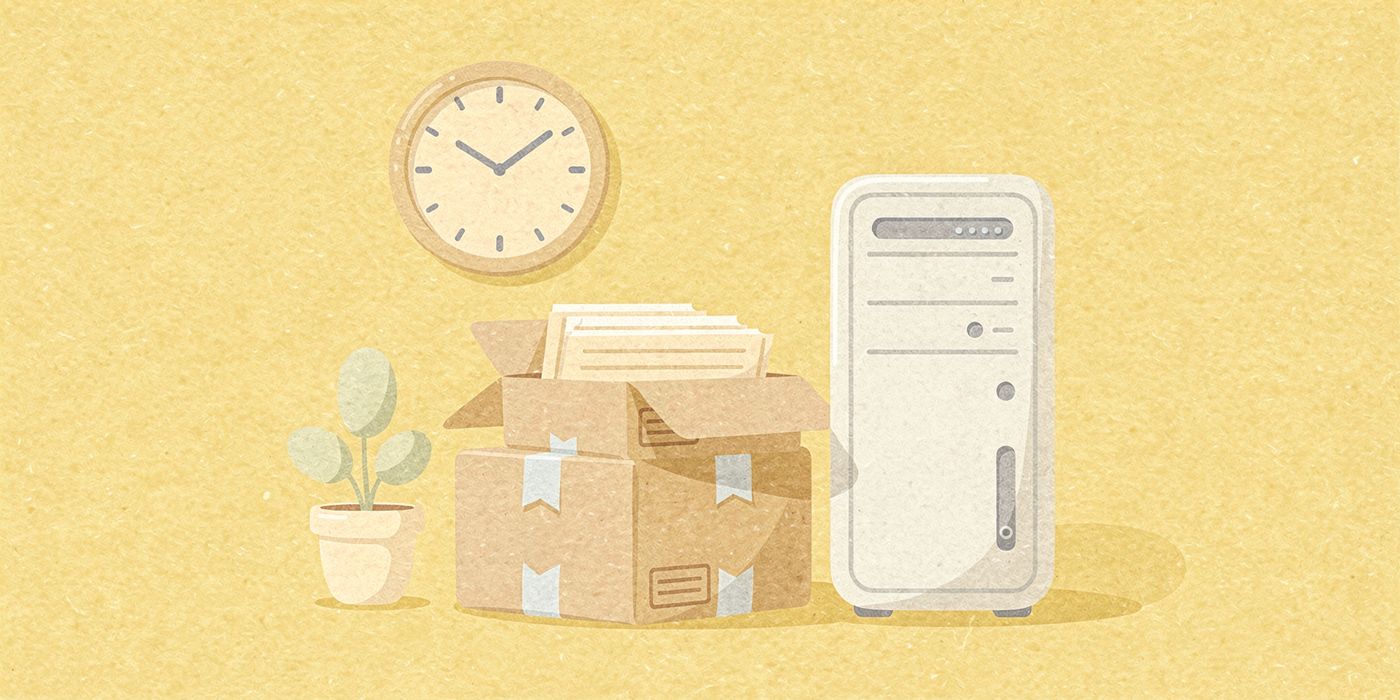 Moving boxes full of files beside a server tower under a wall clock