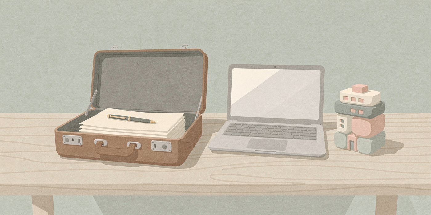 An open briefcase with neat documents beside a laptop and a small model building made of blocks